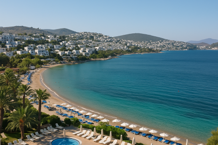 A natural seaside view of Bodrum, showing an all-inclusive resort with clear waters and sun loungers—capturing the relaxed vibe of holidays in Bodrum Turkey all inclusive.